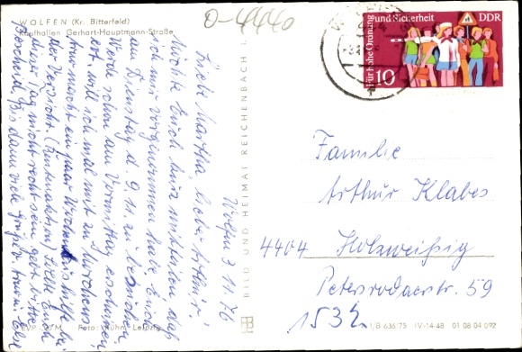 Postcard Wolfen in Saxony Anhalt, department stores Gerhart-Hauptmann-Straße