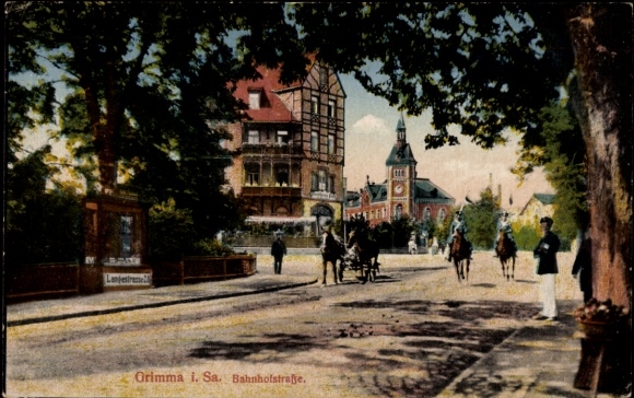 Ak Grimma in Sachsen, Grimma i. Sa., Bahnhofstraße, Pferdewagen, Bäume, Gebäude