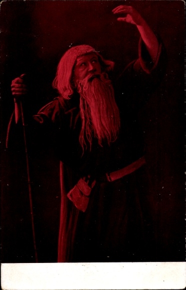 Postcard Man with long beard and stick raises his hand