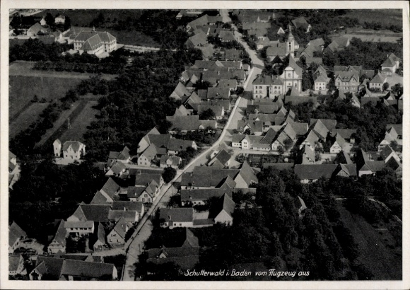 Ak Östringen in Baden, luchtfoto, huizen, straten, kerk, landelijke omgeving