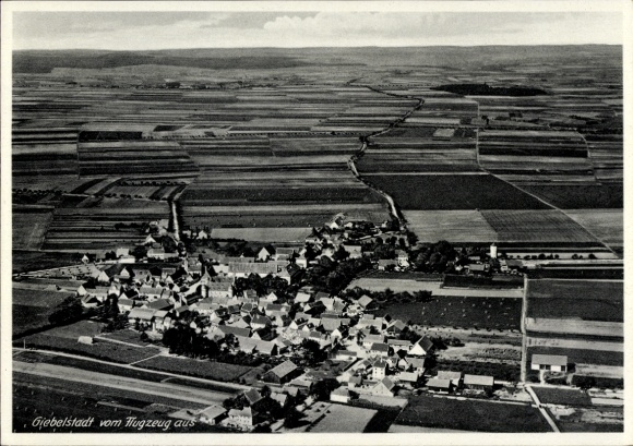 Postcard Giebelstadt in Lower Franconia, aerial view of fields in the background, view of houses
