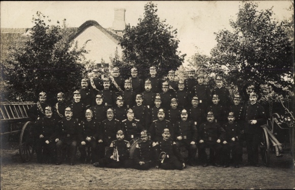 Photo Postcard Niebüll in North Friesland, members of the fire brigade, group picture