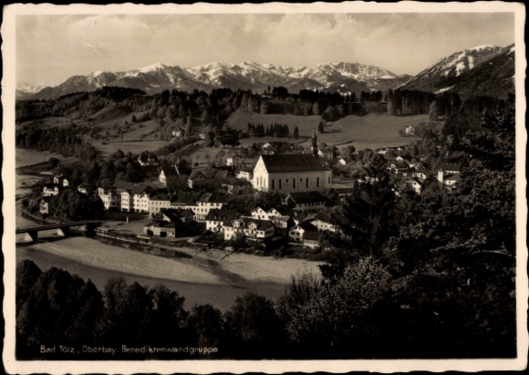 Postcard Bad Tölz in Upper Bavaria, beautiful landscape, Benediktenwand group, village view, mountains in the background