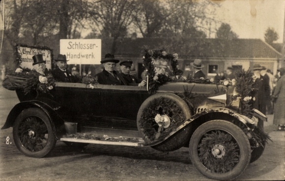 Photo Postcard decorated automobile in a parade, representatives of the metalworking trade