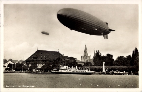 Ak Konstanz am Bodensee, Zeppeline über der Stadt und dem See