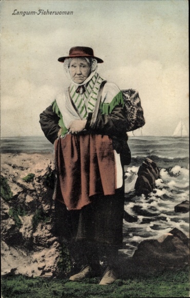 Postcard Llangwm Wales, fisherman's wife in traditional costume