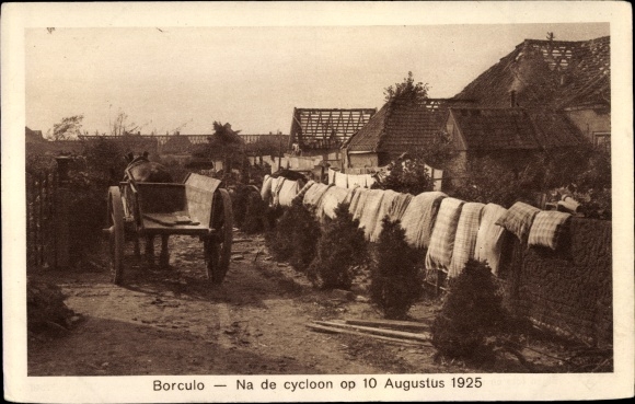 Postcard Borculo Gelderland, after the cyclone 1925, street section, worn roofs, laundry