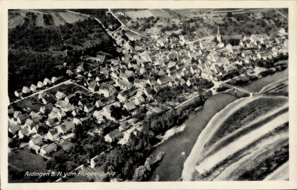 Postcard Aldingen in Württemberg, aerial view of the village houses, river, bridge