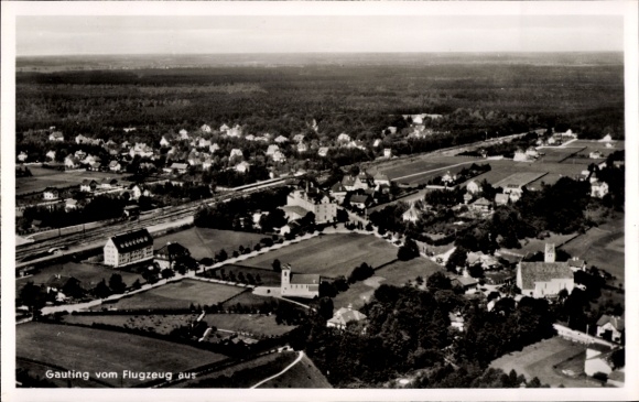 Postcard Gauting in Upper Bavaria, aerial view of village architecture, trees, meadows