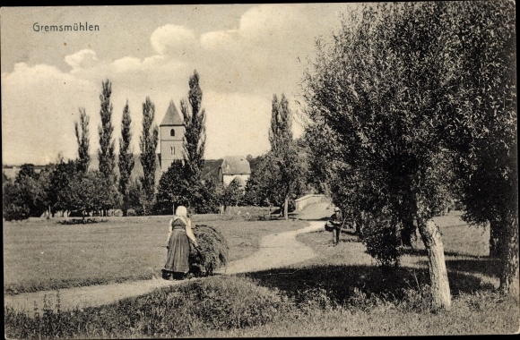 Postcard Grevesmühlen in Mecklenburg, farmer&#39;s wife with hay carts, church tower