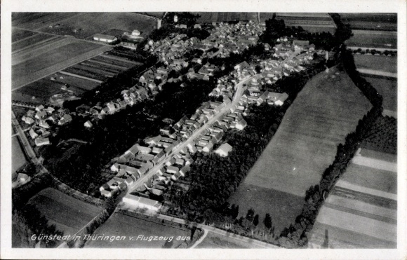 Postcard Günstedt in Thuringia, aerial view of Günstedt, buildings and agriculture,