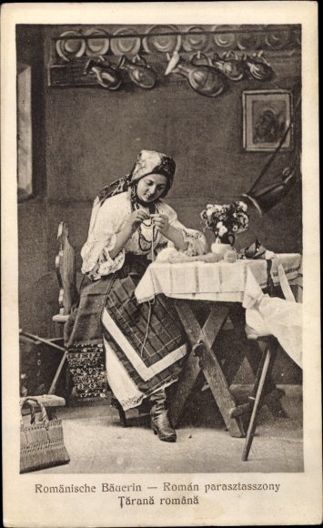 Postcard Romanian peasant woman sewing