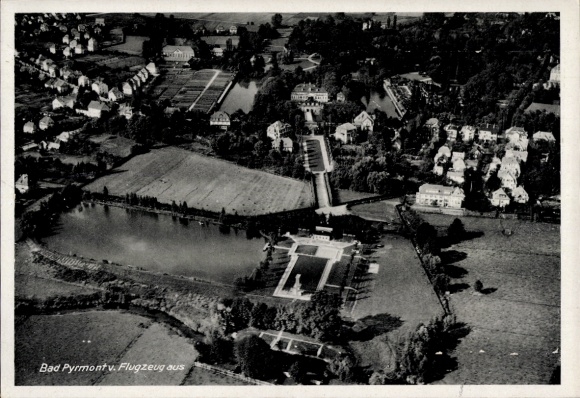 Postcard Bad Pyrmont in Lower Saxony, aerial photograph, park, building, water surface, landscape