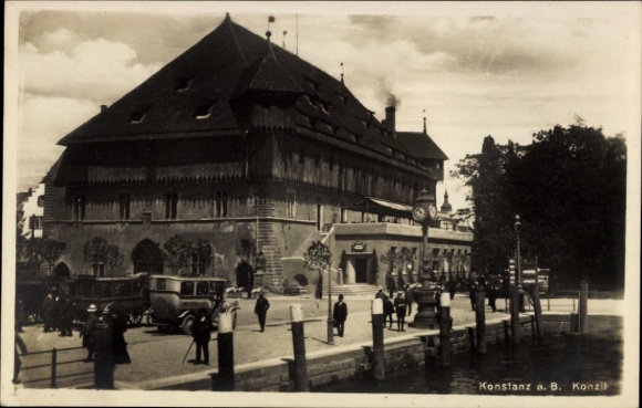 Ak Konstanz am Bodensee, Konstanz a. B. Konzil, s Gebäude, Menschen, Autos