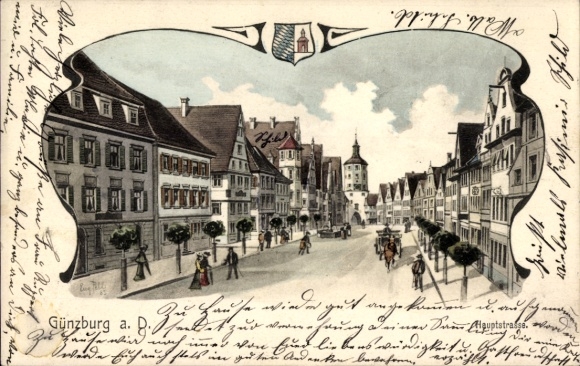 Ak Günzburg an der Donau Schwaben, Stadtansicht von   Architektur, Menschen auf der Straße, Bäume
