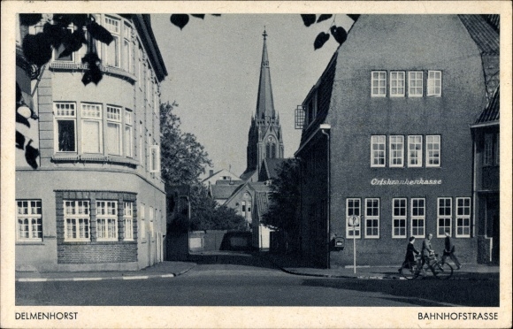 Postcard Delmenhorst in Lower Saxony, Bahnhofstrasse, local health insurance company, church tower