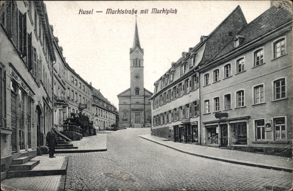 Postcard Kusel am Kuselbach Rhineland Palatinate, market street with marketplace, church, consumer Carl Kraus