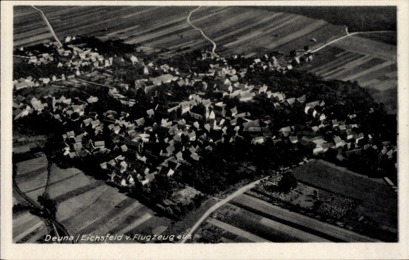 Ak Duderstadt im Eichsfeld, Luftaufnahme von Deuna, ländliche Umgebung, Häuser von oben