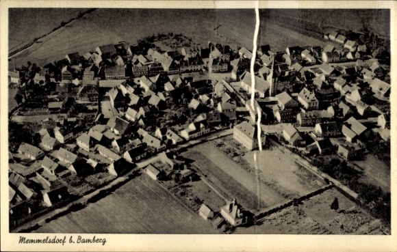 Postcard Memmelsdorf in Upper Franconia, aerial view of the village, many houses, rural surroundings