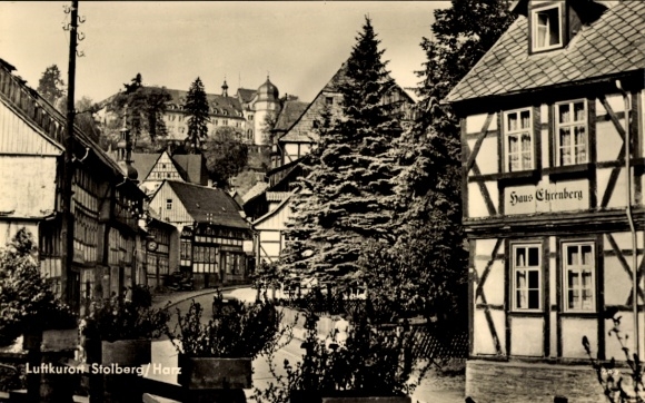 Postcard Stolberg in the Harz Mountains, climatic health resort Stolberg, half-timbered houses, forest, Haus Cheraberg, castles in the background