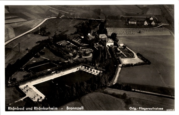 Postcard Bronnzell Fulda in East Hesse, Rhönbad, Rhönkurheim, aerial photograph