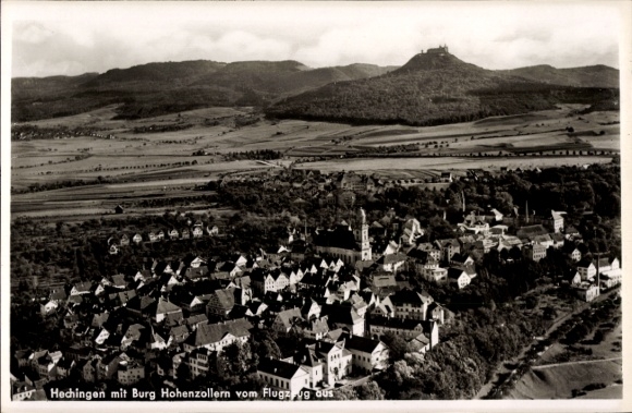 Postcard Hechingen in Zollernalbkreis, aerial view of the town with Hohenzollern Castle