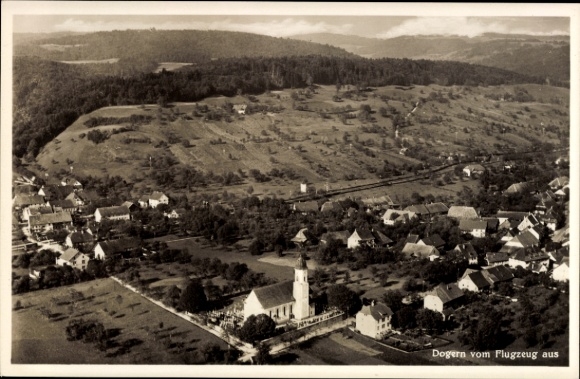 Postcard Dogern am Rhein, aerial view of church in the foreground, rural surroundings