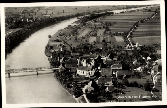 Ak Rheinheim Küssaberg Klettgau, Luftaufnahme von  Fluss, Häuser, Brücke