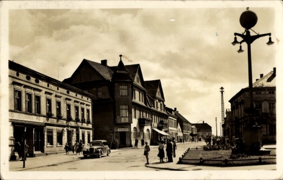 Postcard Wolgast in Mecklenburg Vorpommern, Bahnhofstraße, shoe shop, hotel