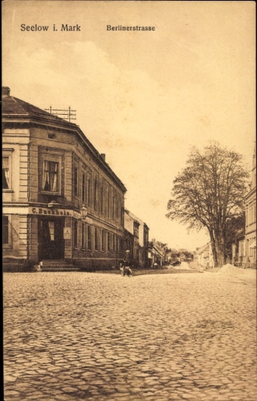 Postcard Seelow in der Mark, Berliner Straße, shop C. Buchholz