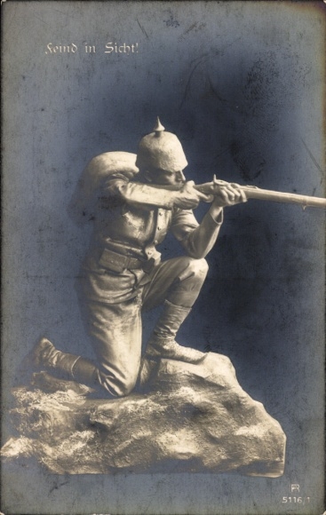 Postcard enemy in sight, soldier with rifle