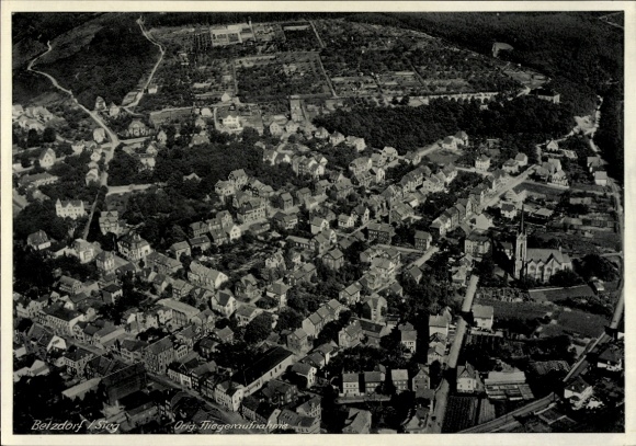 Postcard Betzdorf an der Sieg, aerial view of many houses, green area, church visible, historic