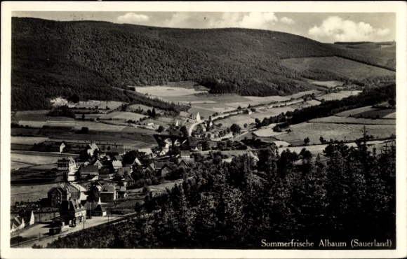 Postcard Balve in Sauerland, landscape photo with village, mountains, forests, clouds