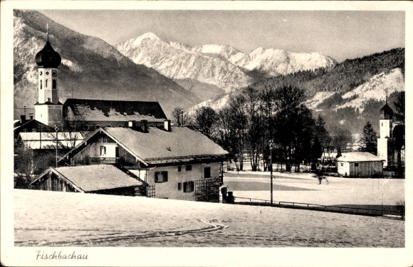 Postcard Fischbachau in Upper Bavaria, snow-covered landscape, church, mountains, houses, winter atmosphere