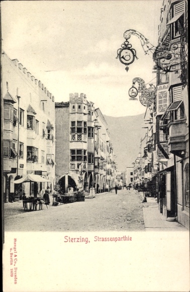 Postcard Sterzing Vipiteno South Tyrol, street with shops, street lamps, architecture