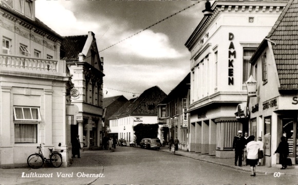 Postcard Varel in Oldenburg Jadebusen, street view, climatic health resort Obernstr., building, bicycle