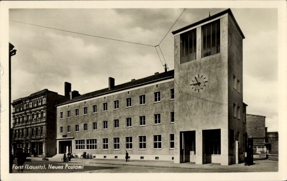 Postcard Forst in Lusatia, new post office, modern architecture, clock tower, cyclists, clouds
