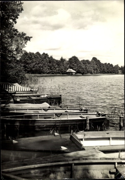 Postcard Kagar Rheinsberg in Brandenburg, boat mooring, calm lake, trees on the shore, cozy style