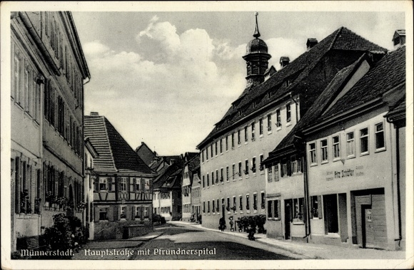Postcard Münnerstadt in Lower Franconia Bavaria, main street with prebendary hospital, business Fritz Schäfer