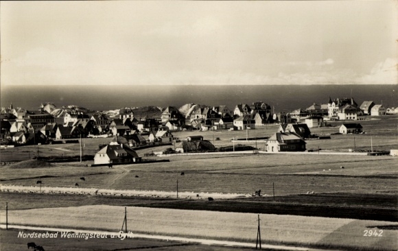 Postcard Wenningstedt on Sylt, North Sea resort coastal landscape, houses, sea in the background