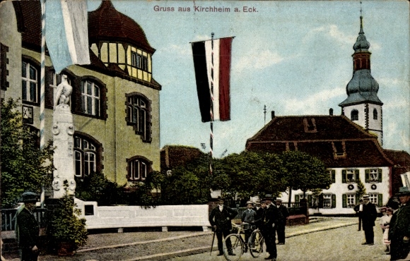 Ak Kirchheim an der Eck Kirchheim an der Weinstraße Pfalz, Straße, Flaggenschmuck, Denkmal