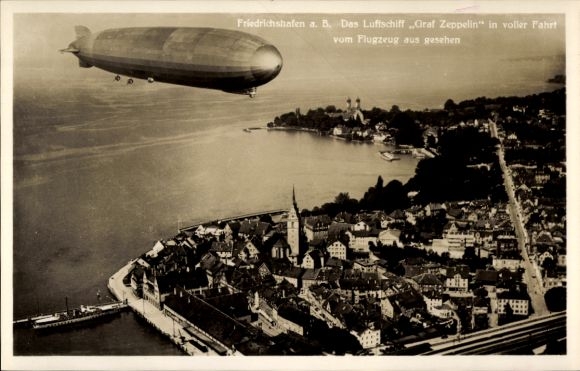 Postcard Friedrichshafen on Lake Constance, airship LZ 127 Graf Zeppelin at full speed, aerial photograph