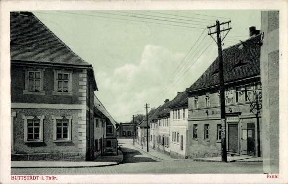 Postcard Buttstädt in Thuringia, Brühl, street scene, fur shop