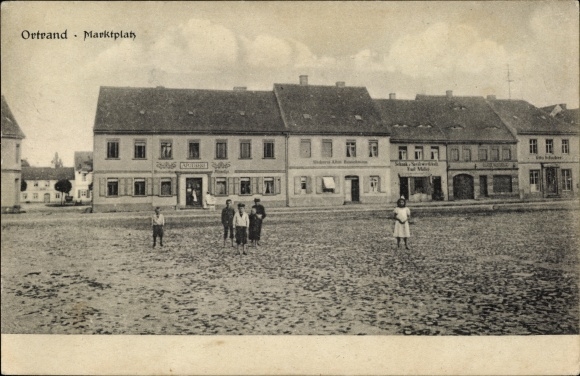 Postcard Ortrand in Niederlausitz, market square, shops