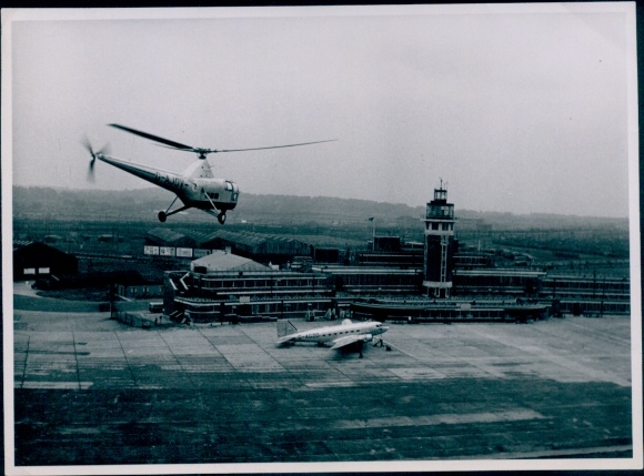 Photo helicopter, passenger plane, airport