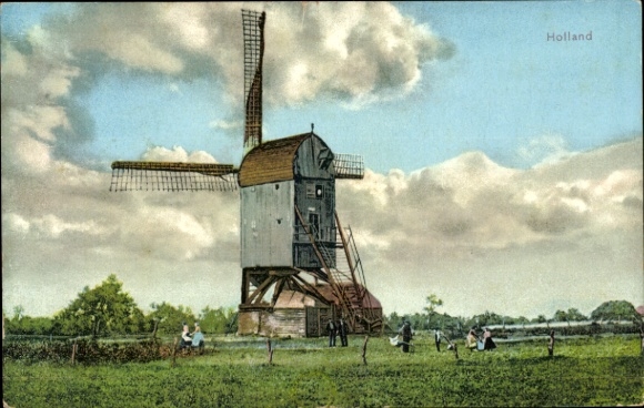 KP Wierden Overijssel, wiatrak, zielona łąka, chmury, Holandia