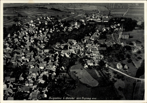 Postcard Burgsolms Solms in Hesse, aerial view of many houses, landscape, church building