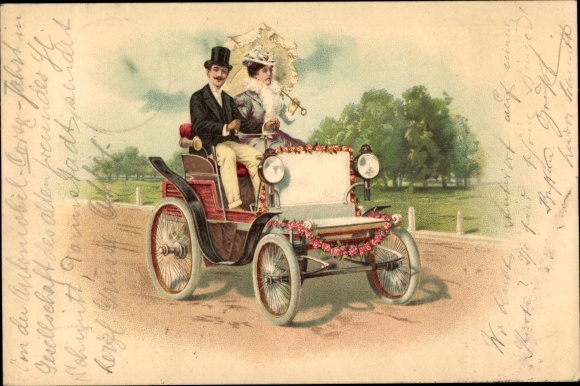 Chromo-Litho Couple on a drive in an automobile, wreathed with flowers on a fast vehicle