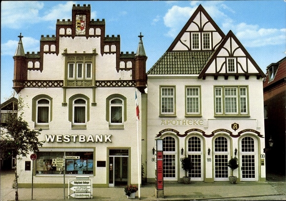 Ak Tönning aan de Eider Noord-Friesland, twee puntgevelhuizen, westoever, apotheek, prachtig vormgegeven fa
