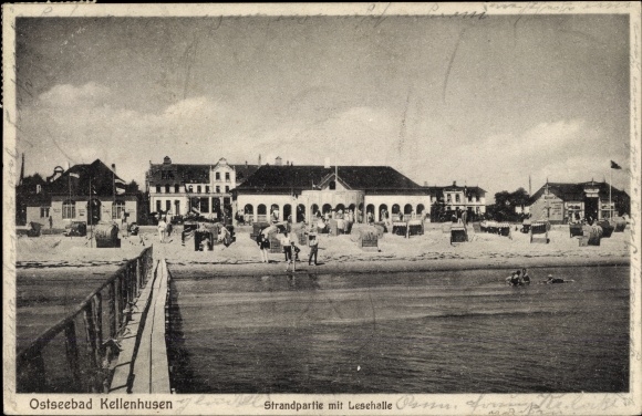 Postcard Baltic resort Kellenhusen in Holstein, beach area with reading hall